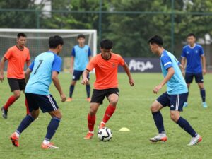 Chapin High School football players practicing on the field