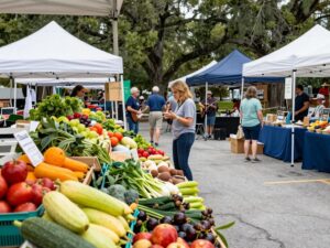Vibrant scene at Chapin Downtown Farmers Market with fresh produce and local artisans.